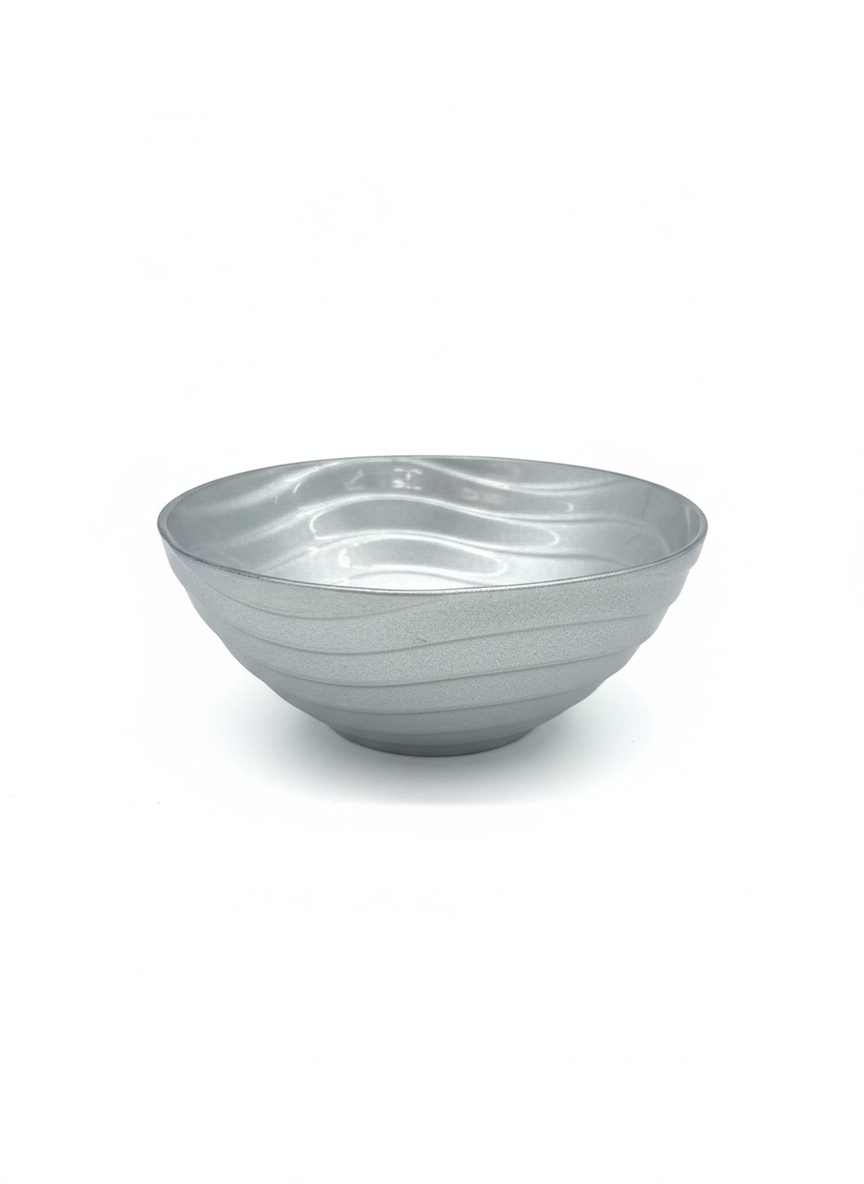 Bol design argenté à reliefs ondulés